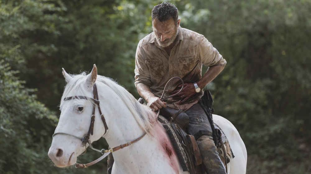 Injured Rick Grimes bleeding on his horse