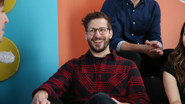 Andy Samberg at event smiling