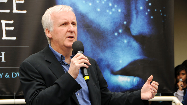 James Cameron speaking into microphone