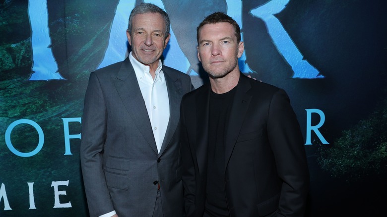 Bob Iger smiling with Sam Worthington