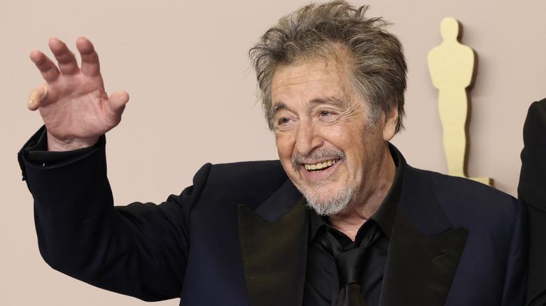 Al Pacino waving and smiling