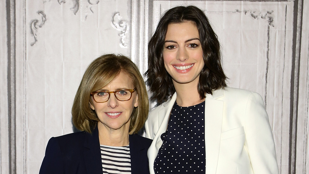 Nancy Meyers and Anne Hathaway smiling