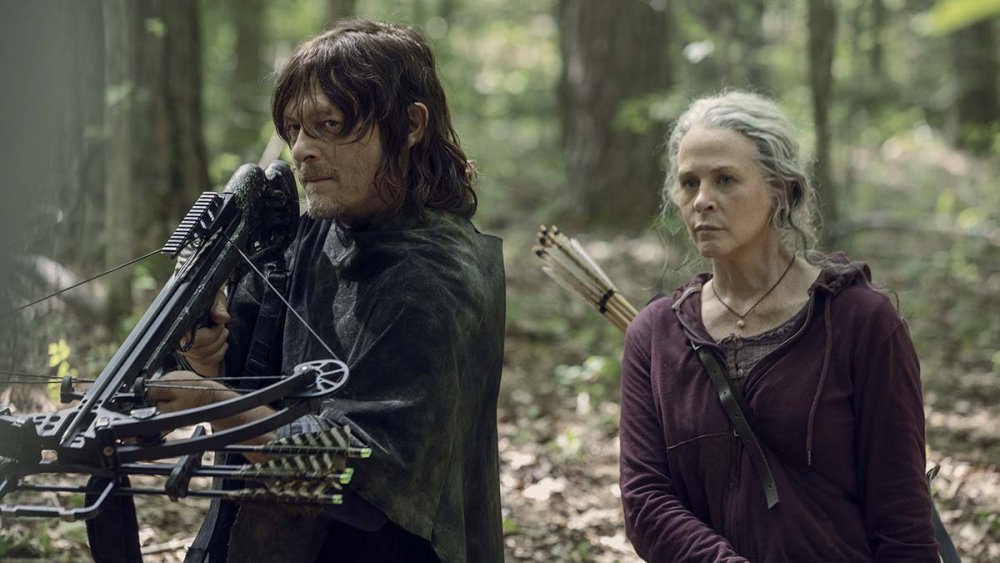 Hunger Games Carol out hunting with Norman Reedus' Daryl Dixon