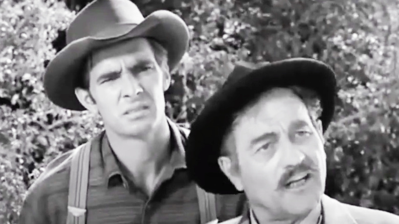 Dennis Weaver and Milburn Stone talking