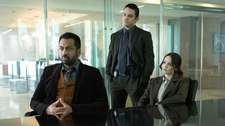 Clarice cast members sit around an office conference table