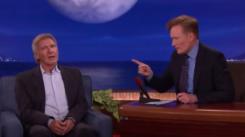 Conan O'Brien pointing Harrison Ford