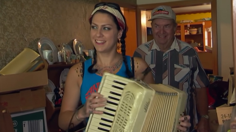 Colby holding an accordion