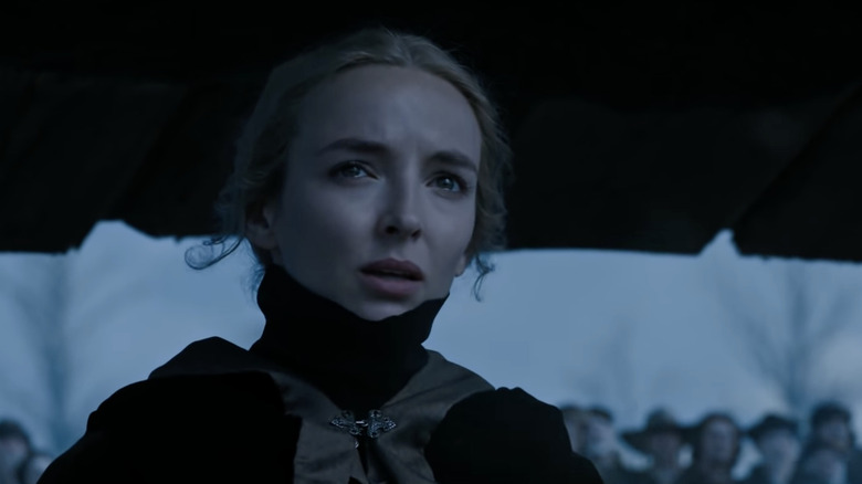 Jodie Comer observing a tense situation The Last Duel