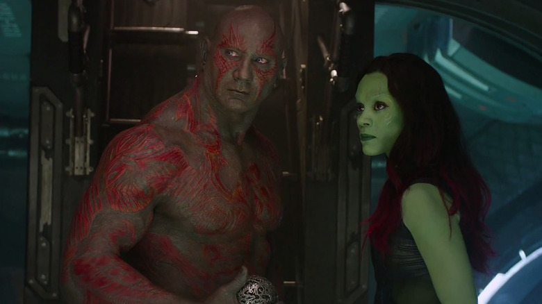 Drax and Gamora look sideways