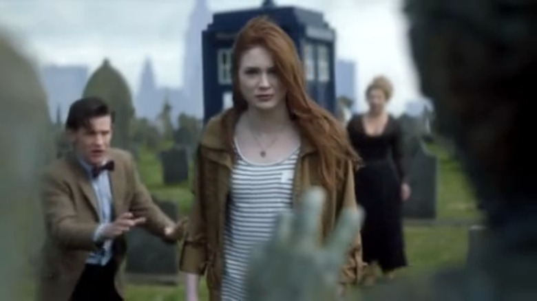 Karen Gillan as Amy Pond approaches weeping angel in Doctor Who