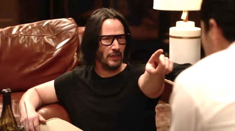 Keanu Reeves pointing