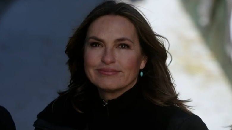 Benson smiling idealistically