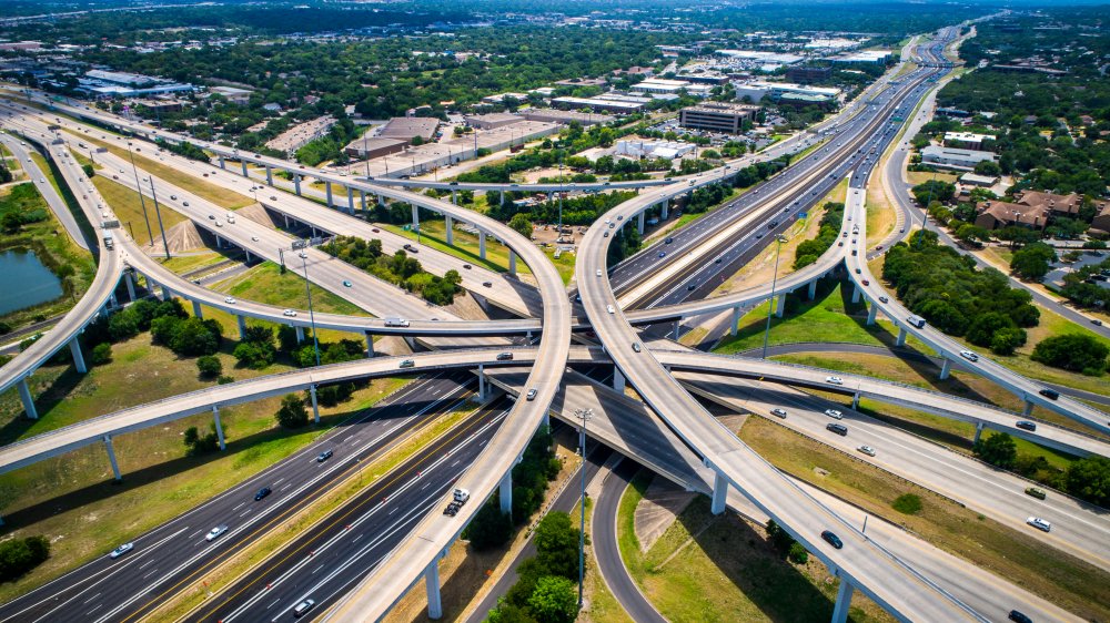 a freeway interchange, the greatest sign of suburban sprawl