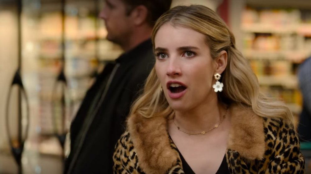 Emma Roberts and an actor who looks passingly like Ryan Gosling in Holidate