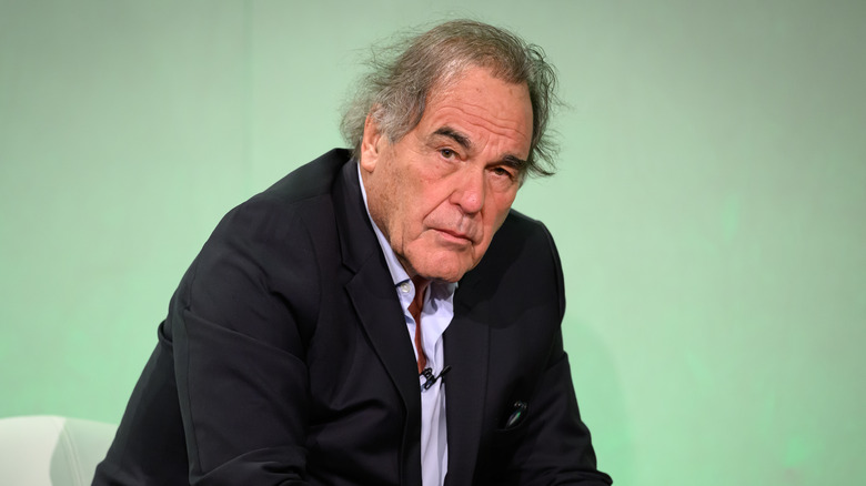 Oliver Stone listens to question at a Q&A