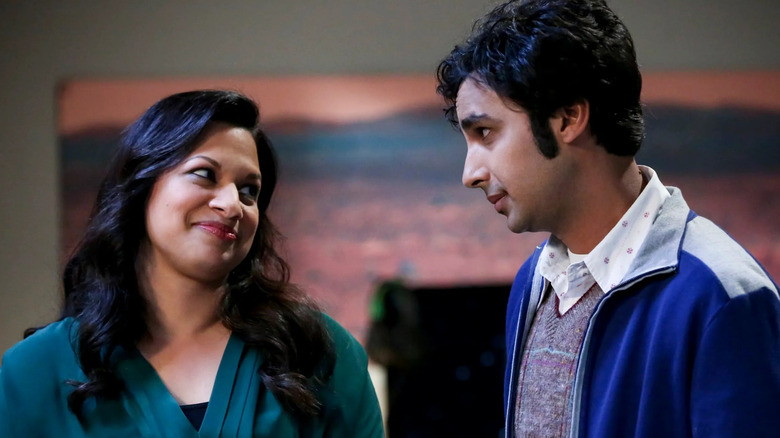 Raj and Anu looking at each other