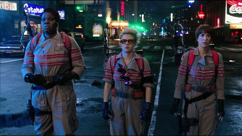 Female Ghostbusters standing in Times Square