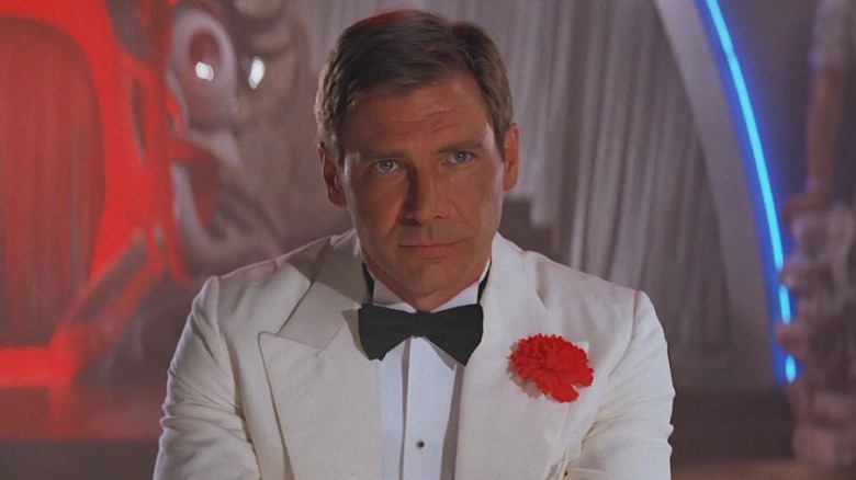 Indiana Jones wearing a white tuxedo