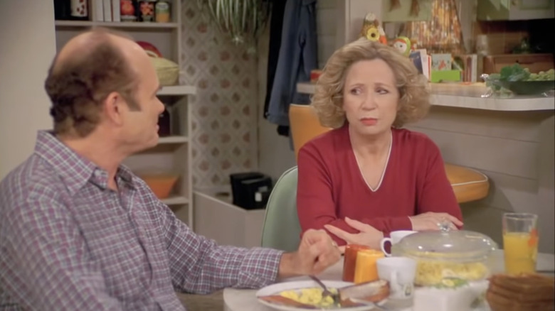 Red and Kitty Forman at dinner table