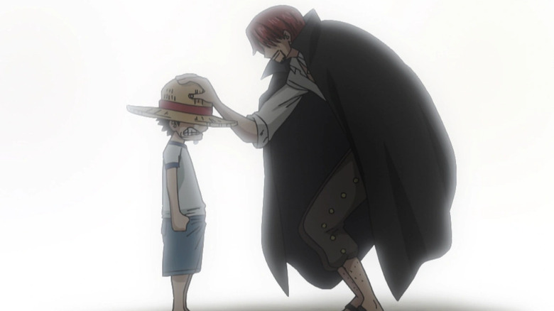 Shanks comforts young crying Luffy