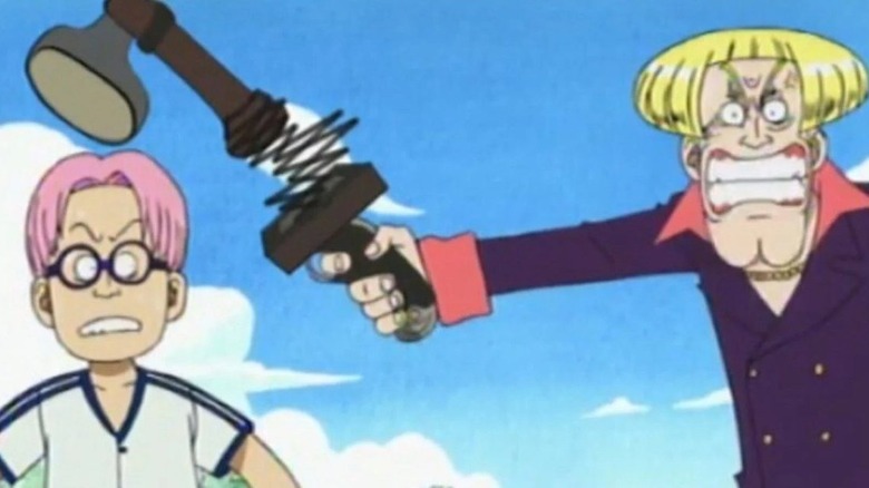 Helmeppo holds a hammer-gun