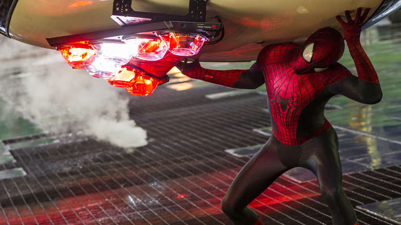 Spider-Man catching a cop car