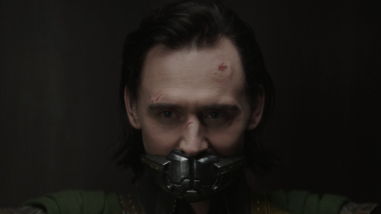 Loki smirking in elevator