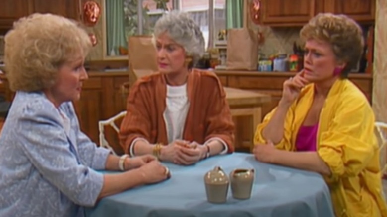 Betty White, Bea Arthur, Rue McClanahan at table in Golden Girls