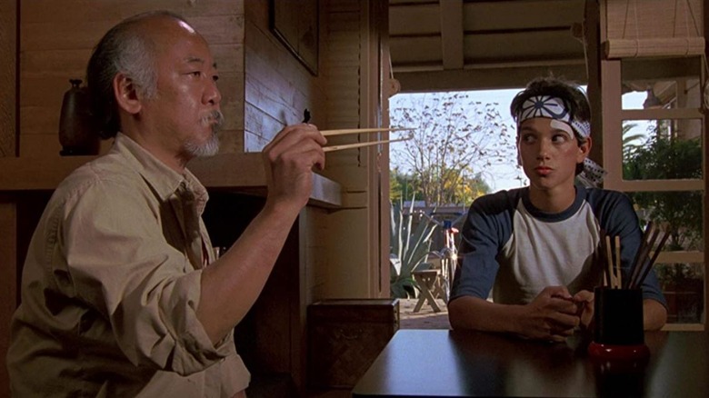 Pat Morita and Ralph Macchio in The Karate Kid