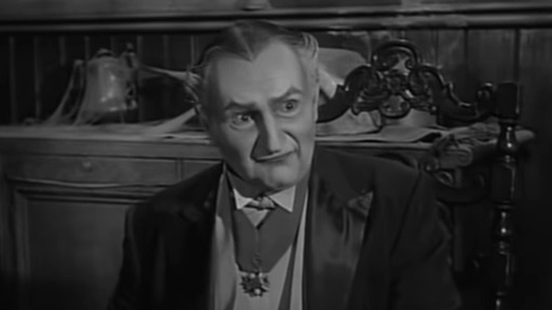 Grandpa Munster eyebrows raised 