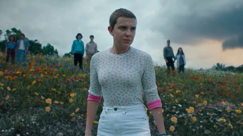 Eleven in field with friends