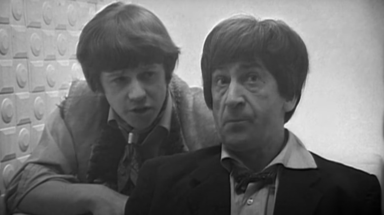 Jamie leans over Second Doctor