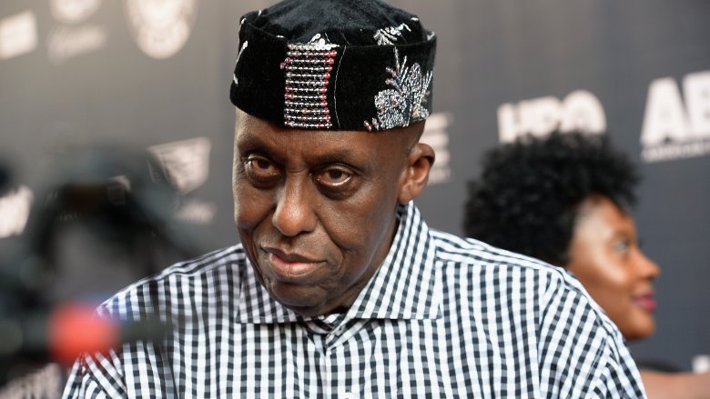 Bill Duke in checked shirt