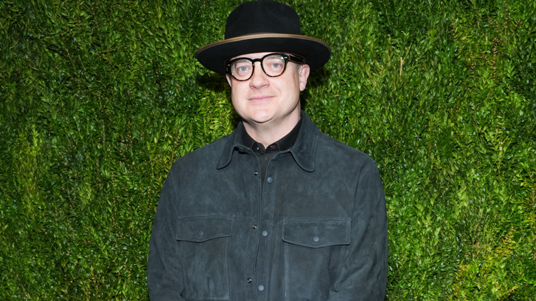 Brendan Fraser wearing hat and glasses