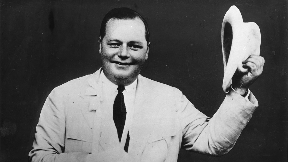 Fatty Arbuckle lifting hat