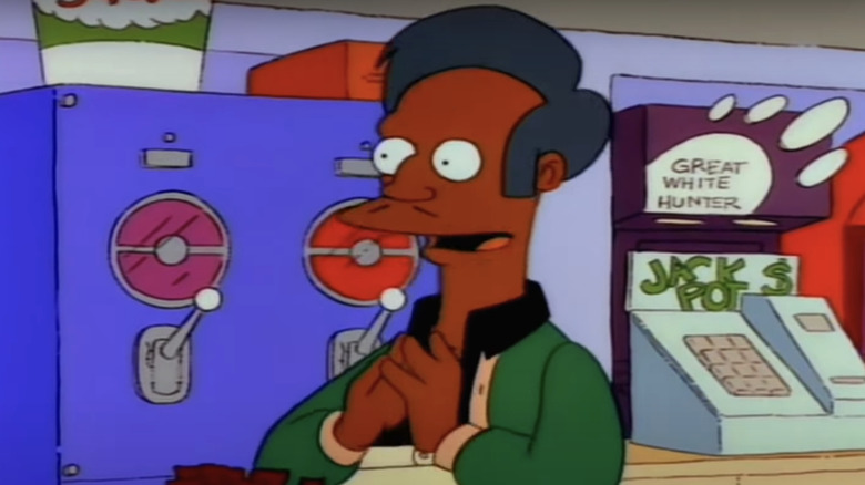 apu smiling in kwik-e-mart simpsons