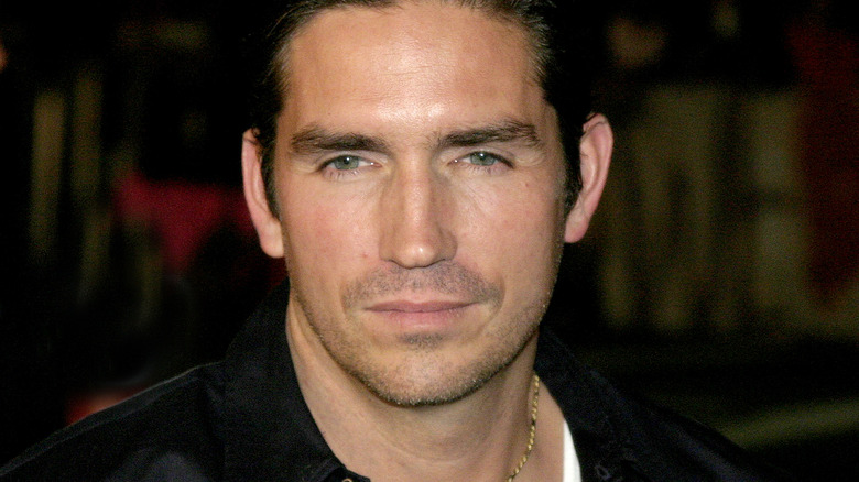 Jim Caviezel in a leather jacket