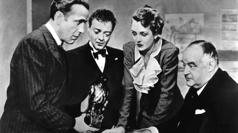 Humphrey Bogart with the titular Maltese Falcon