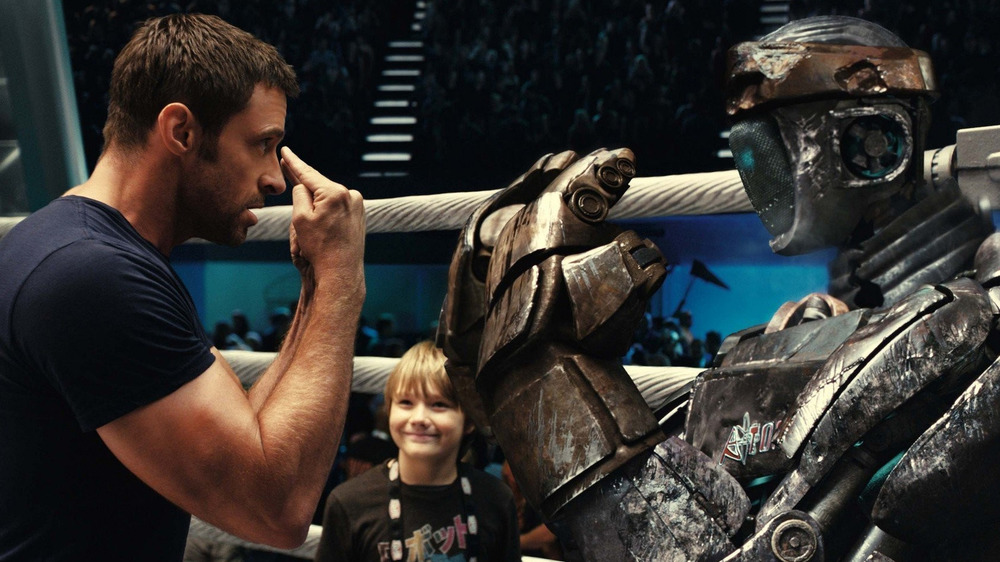 Hugh Jackman coaching robot boxer