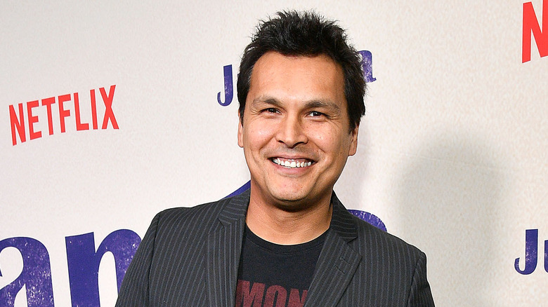 Adam Beach smiles