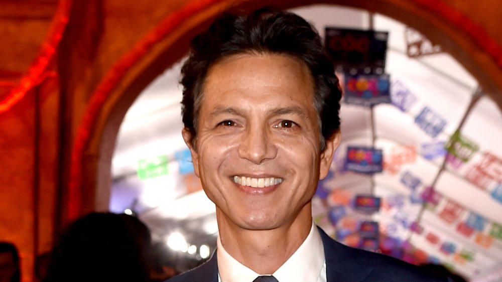 Benjamin Bratt smiles