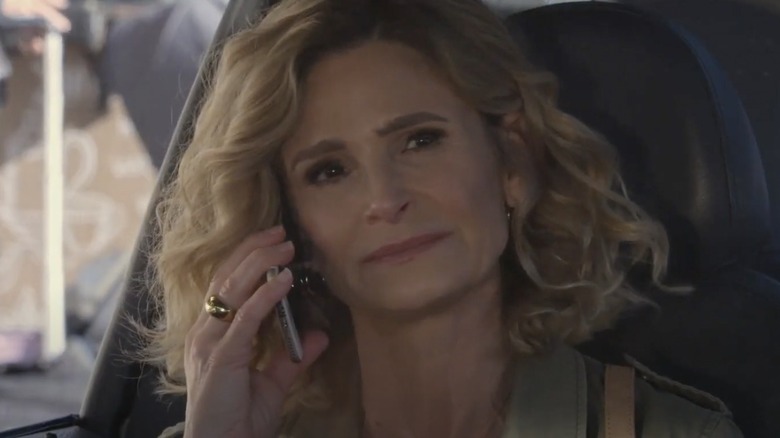 Kyra Sedgwick on phone