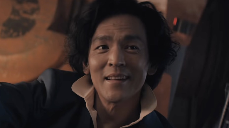 John Cho smiling in live-action Cowboy Bebop