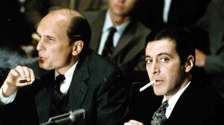 Tom Hagen and Michael Corleone smoking