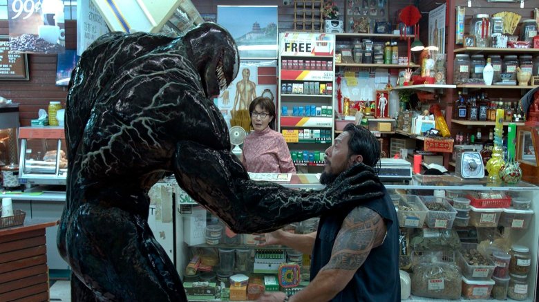 Venom about to eat a guy