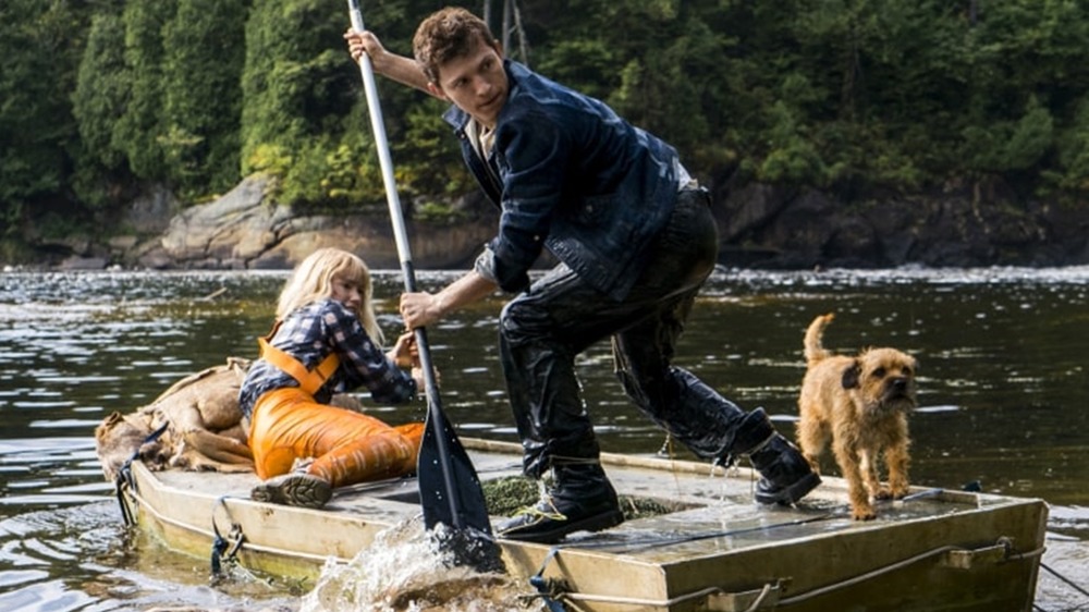 Tom Holland paddling rowboat