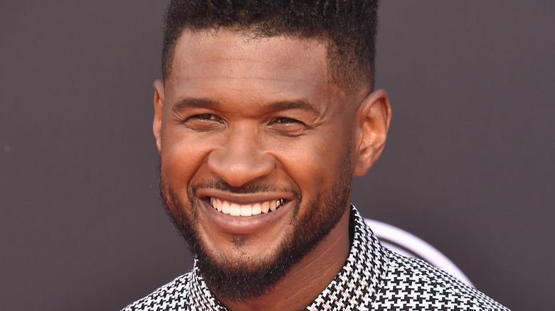 Usher smiling