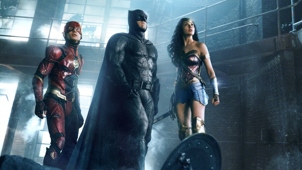 Ezra Miller, Ben Affleck, and Gal Gadot as The Flash, Batman, and Wonder Woman in Justice League