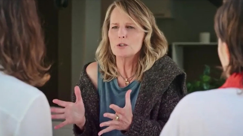 Helen Hunt gesturing with both hands