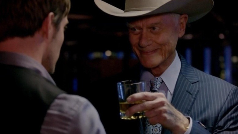 J.R. Ewing toasting